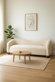 Modern Cream Curved Sofa Ð Minimalist Fabric Couch with Rounded Design and Wooden Legs