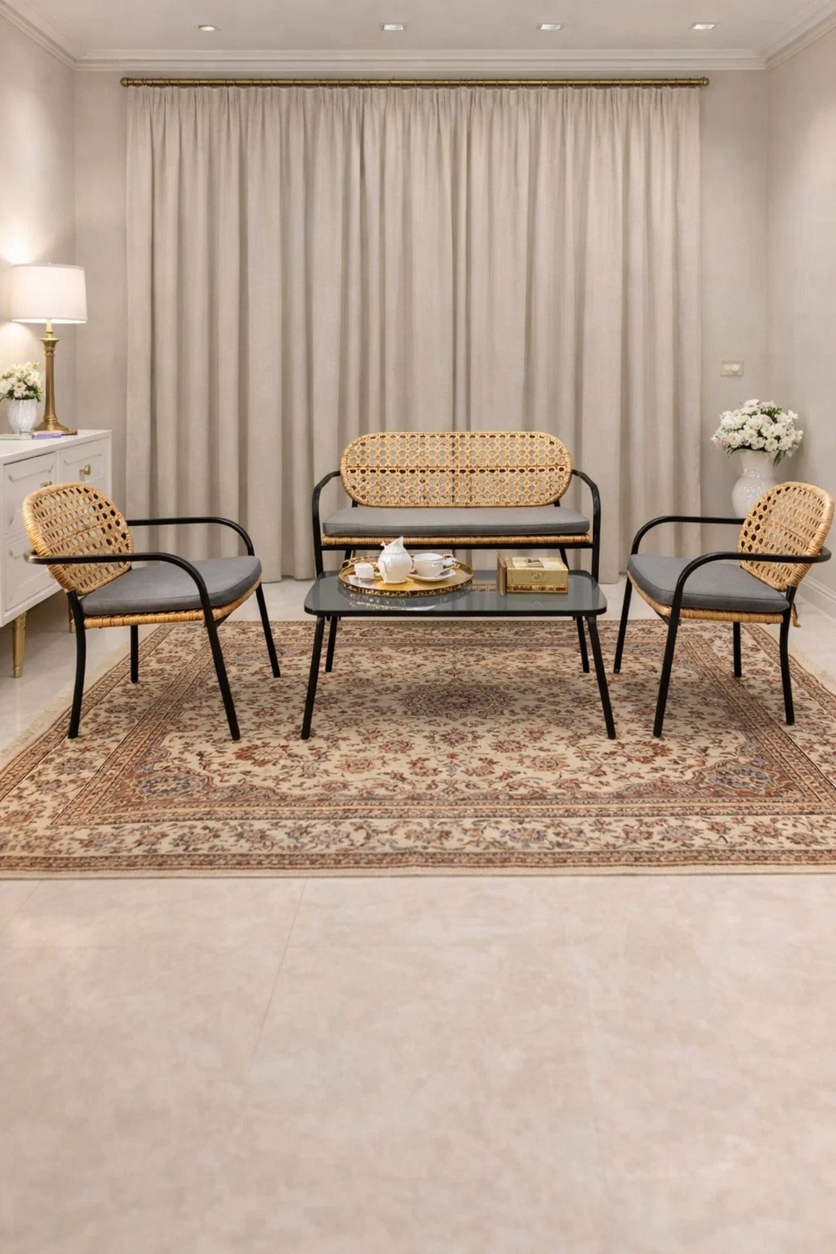 Stylish 4-Piece Wicker Patio Furniture Set with Black Metal Frame Grey Cushions Coffee Table