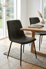 Dark Upholstered Dining Chair with Black Metal Legs for Home Dining Spaces