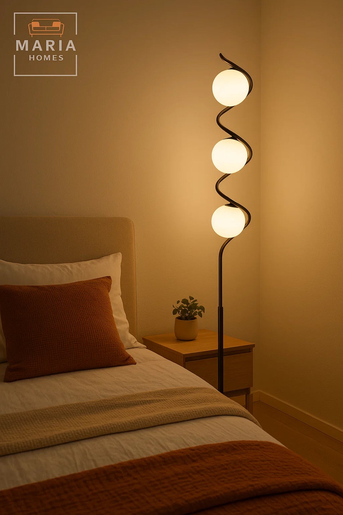 Stylish floor lamp with a spiral black frame and three frosted globes Great for modern interiors