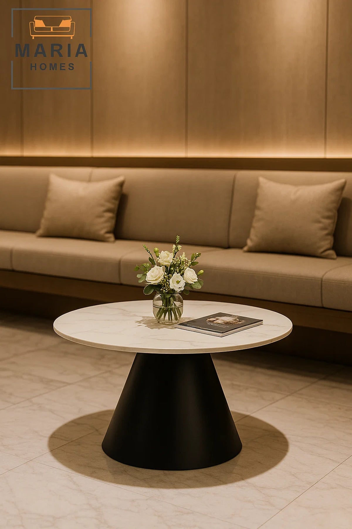 Round white marble table with black cone base