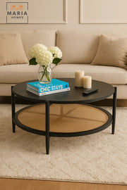 Large black round table with rattan shelf and wooden top