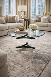 Stylish Round Center Table with Clear Acrylic Legs and Black Frame for Contemporary Living Areas