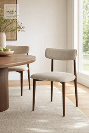 Beige Upholstered Dining Chair with Wooden Frame and Curved Backrest