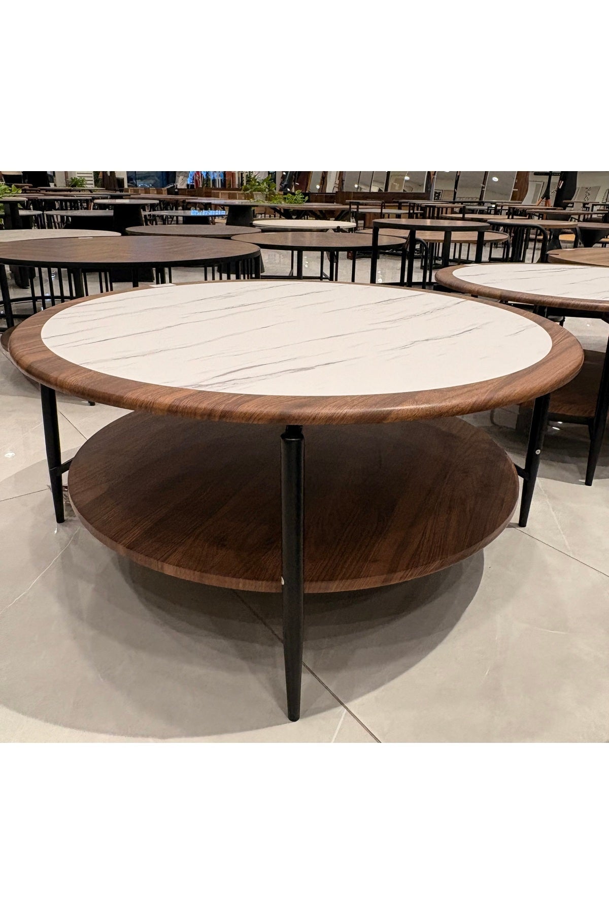 Elegant marble and walnut round coffee table with shelf