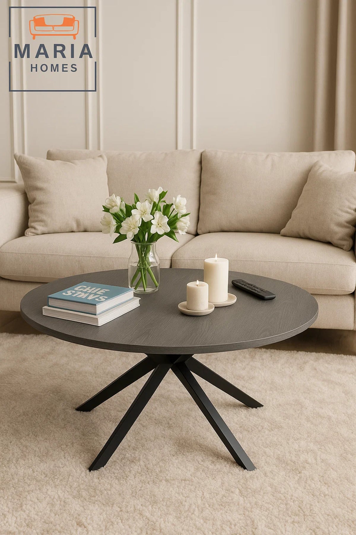 Minimalist round stone-look table with black cross base