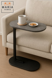 A versatile side table, adjustable 360 __degrees, suitable for sofas and small spaces.