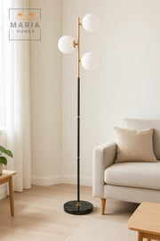 Black and Gold Floor Lamp with Three Globe Lights