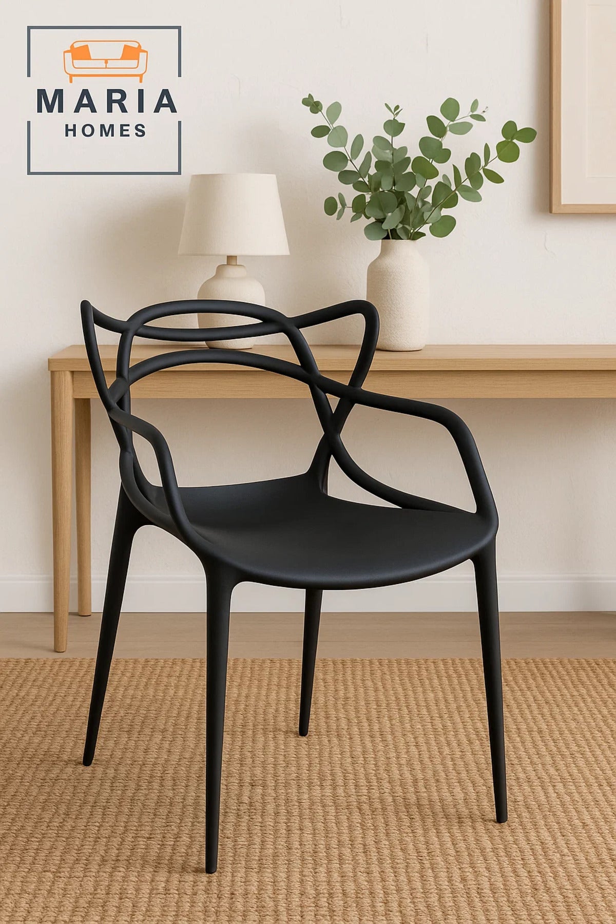 Modern Black Designer Plastic Chair Ð Sleek Stackable Armchair for Indoor and Outdoor Use