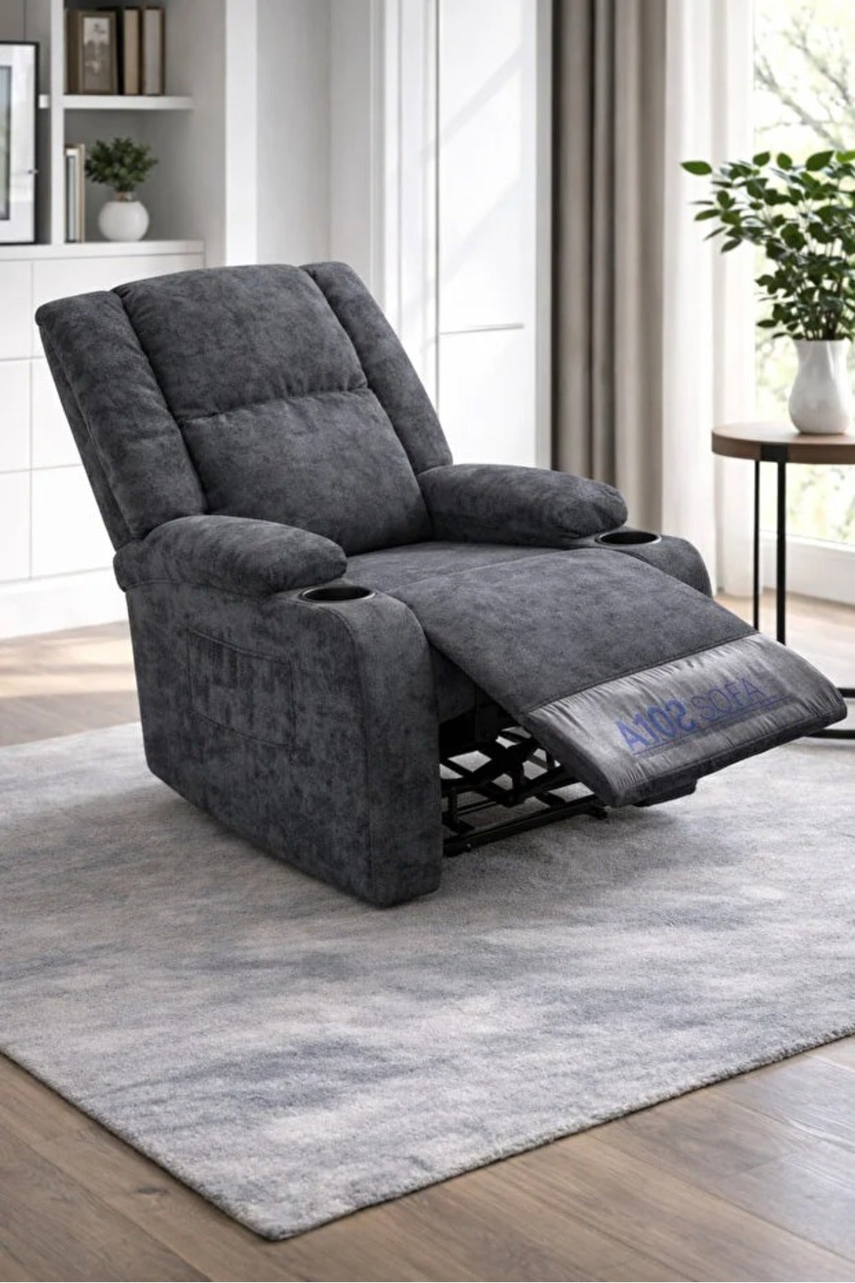 Comfortable adjustable recliner chair in gray with footrest