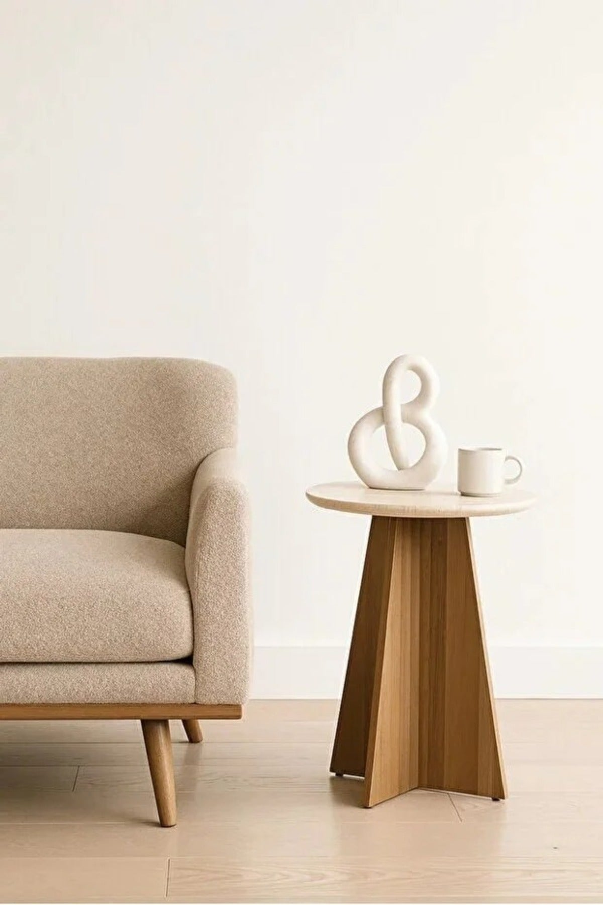 Round side table with a black wooden base Ð a distinctive modern table 45x55 cm