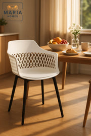 White DiamondBack Plastic Armchair Modern Indoor Outdoor Chair with Black Legs and Ventilated Design