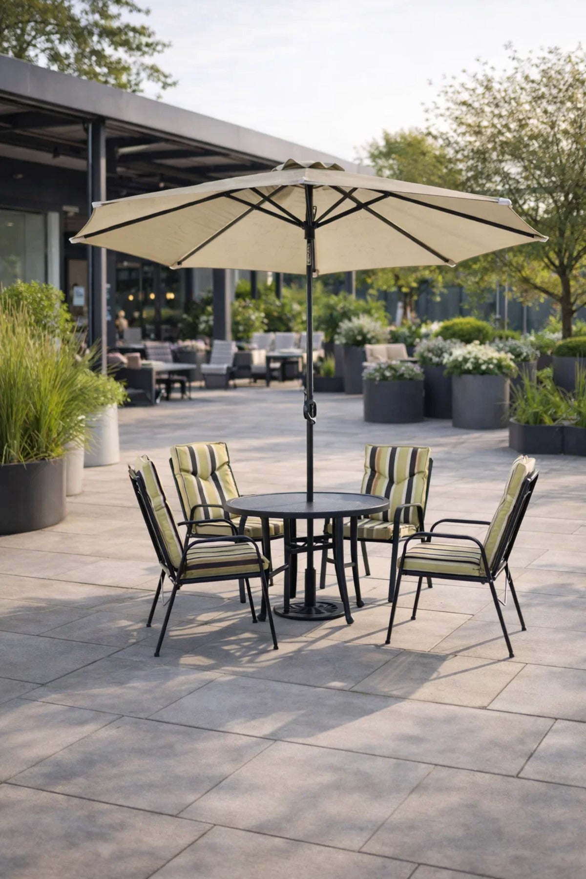 Modern Outdoor Garden Dining Set with Parasol Round Table and Four Comfortable Striped Chairs