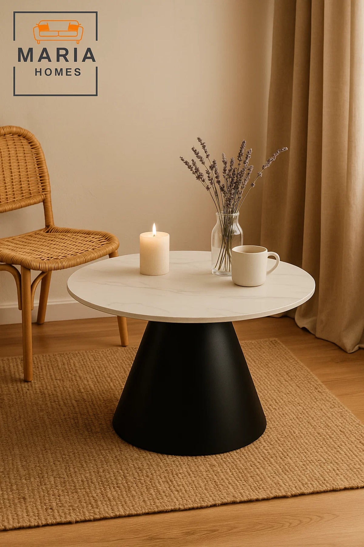 Round white marble table with black cone base