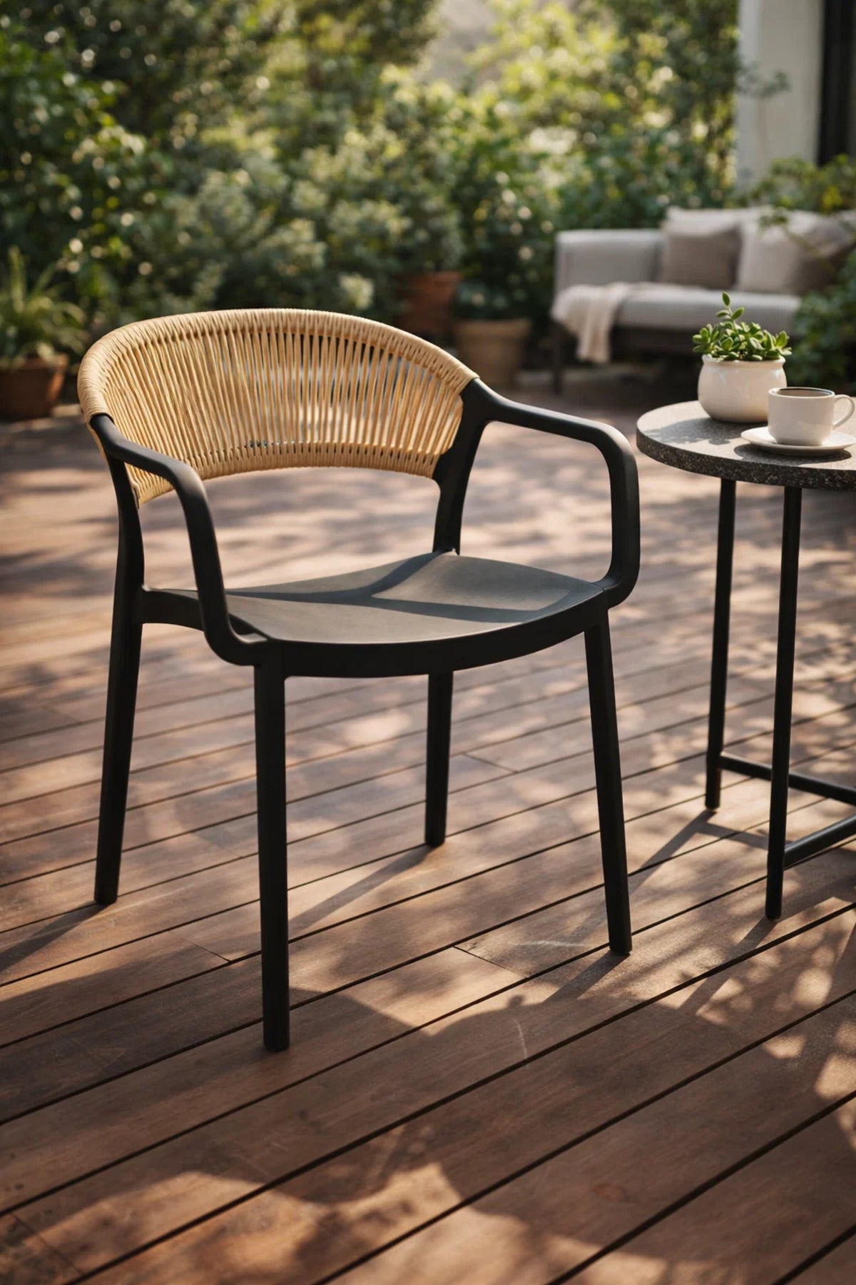 Modern Black Dining Chair with Brown Rattan Back and Armrests for Indoor Outdoor Use