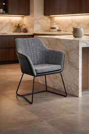 Contemporary Grey Fabric Dining Chair with Black Leather Back and Sled Legs for Modern Interiors