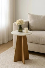Round side table with a black wooden base Ð a distinctive modern table 45x55 cm