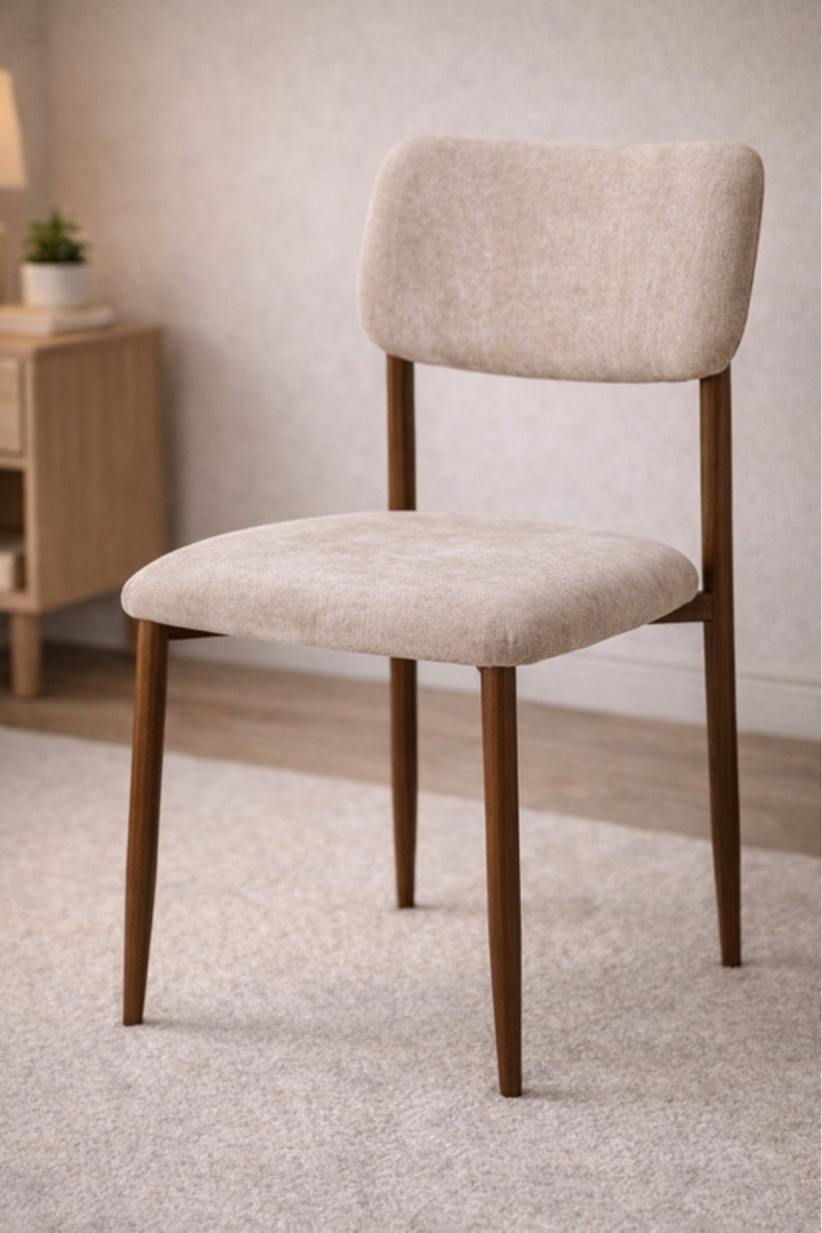 Stylish Beige Upholstered Dining Chair with Sturdy Metal Legs for Modern Kitchen Interiors