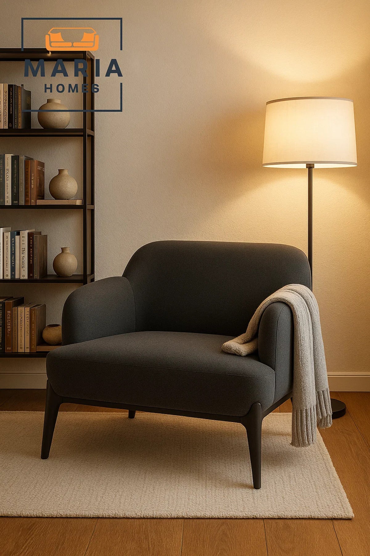 Modern Dark Grey Armchair with Curved Back and Tapered Legs