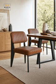 Brown Padded Dining Chair with Upholstered Seat, Ribbed Backrest and Black Metal Legs
