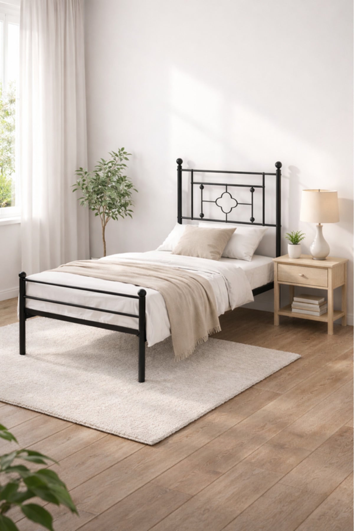 Black Metal Single Bed Frame classic design with decorative detailing on the headboard,