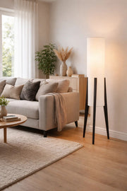 Modern Floor Lamp with Fabric Shade and Black Wooden Tripod Legs for Home Decor