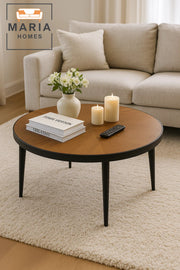 Round wooden coffee table with elegant starburst pattern