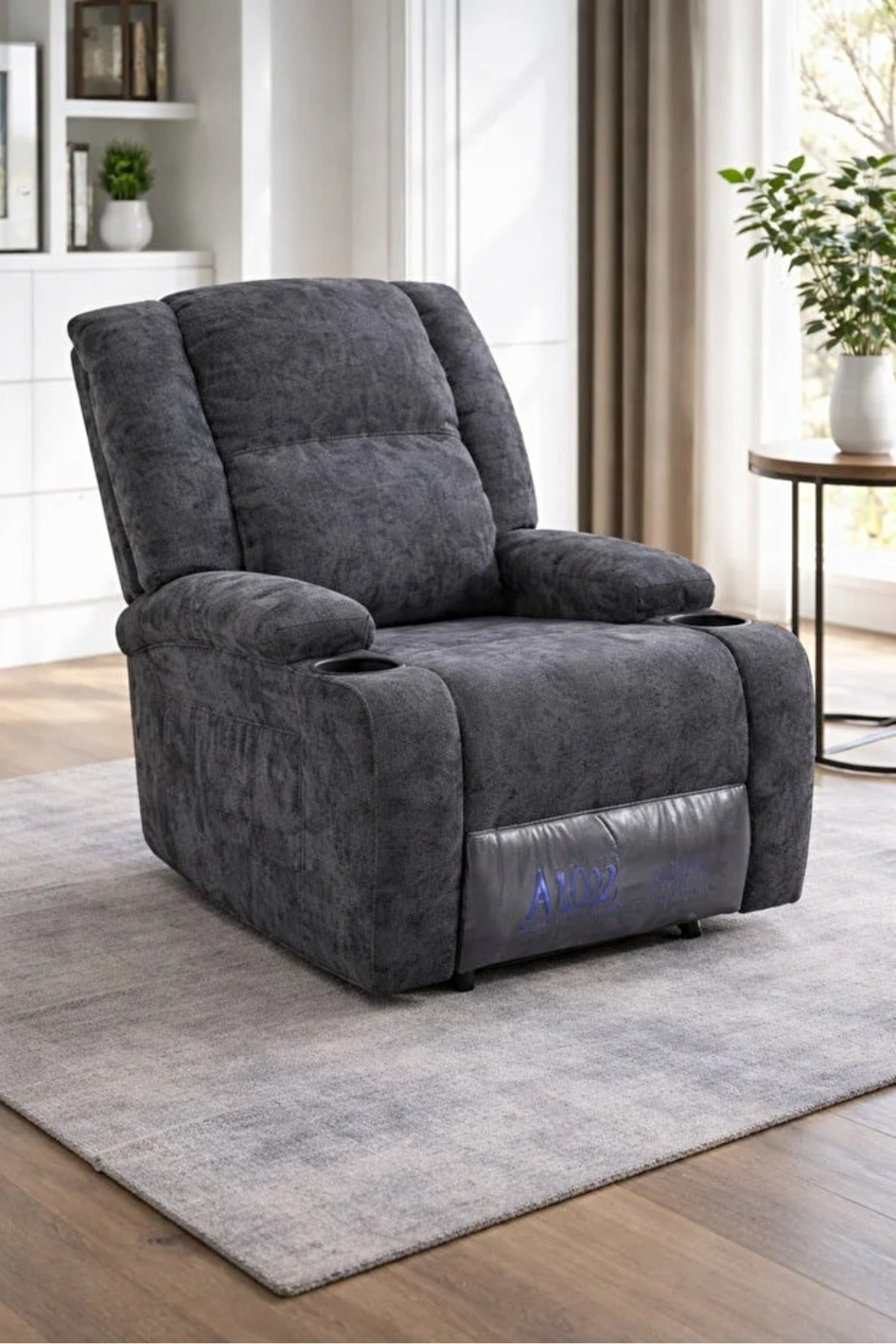 Comfortable adjustable recliner chair in gray with footrest