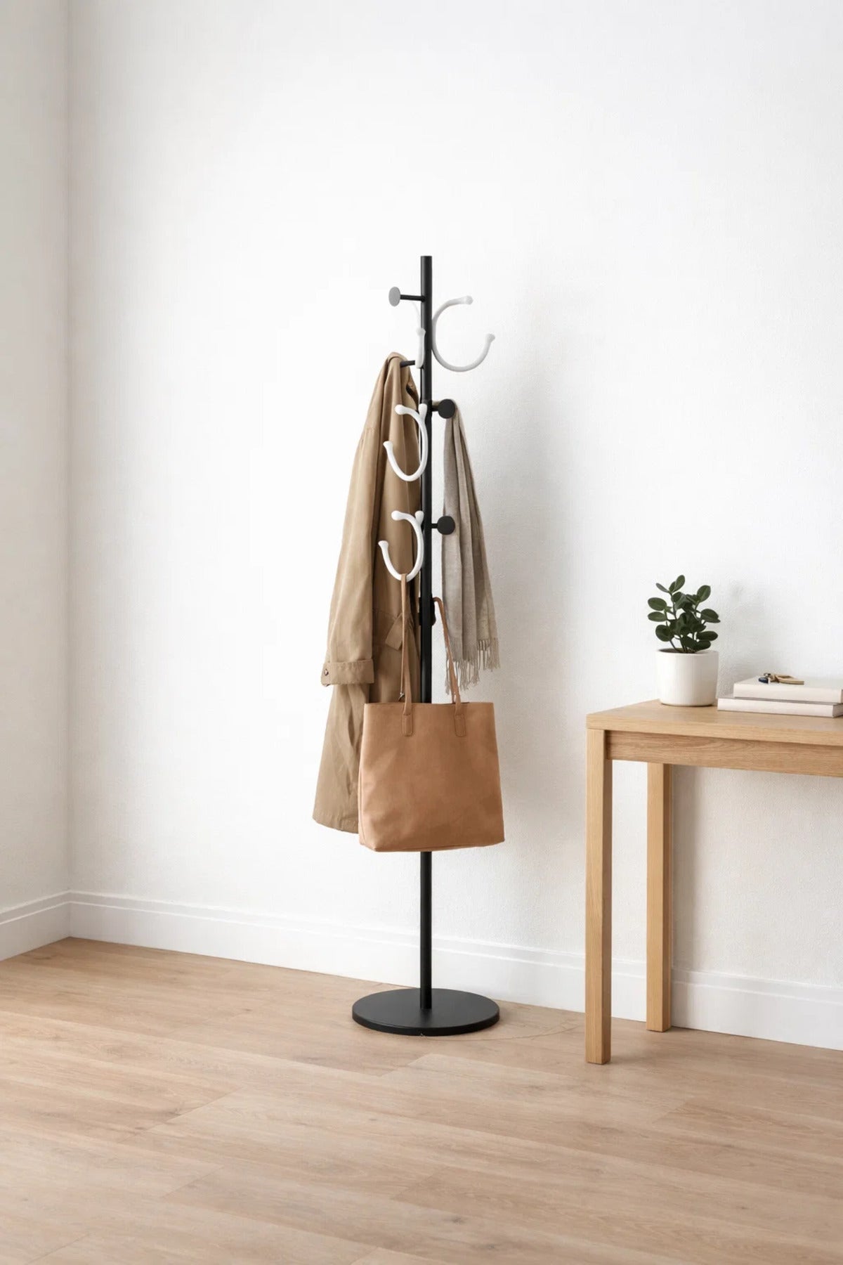 Elegant Floor Standing Metal Coat Hanger Rack with Modern Circular Hooks for Home and Office Use