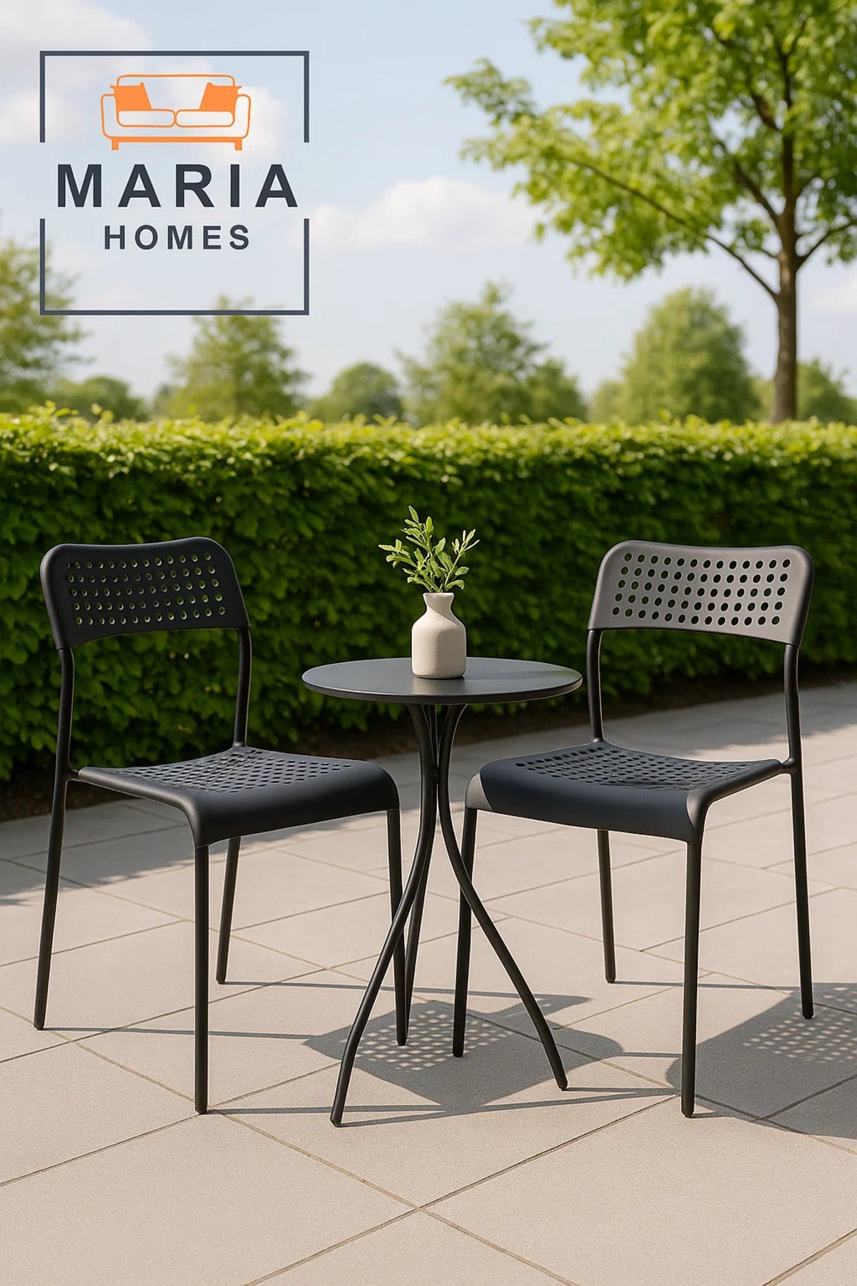 Modern Black Plastic Chair with Perforated Back and Seat Ð Lightweight & Stackable