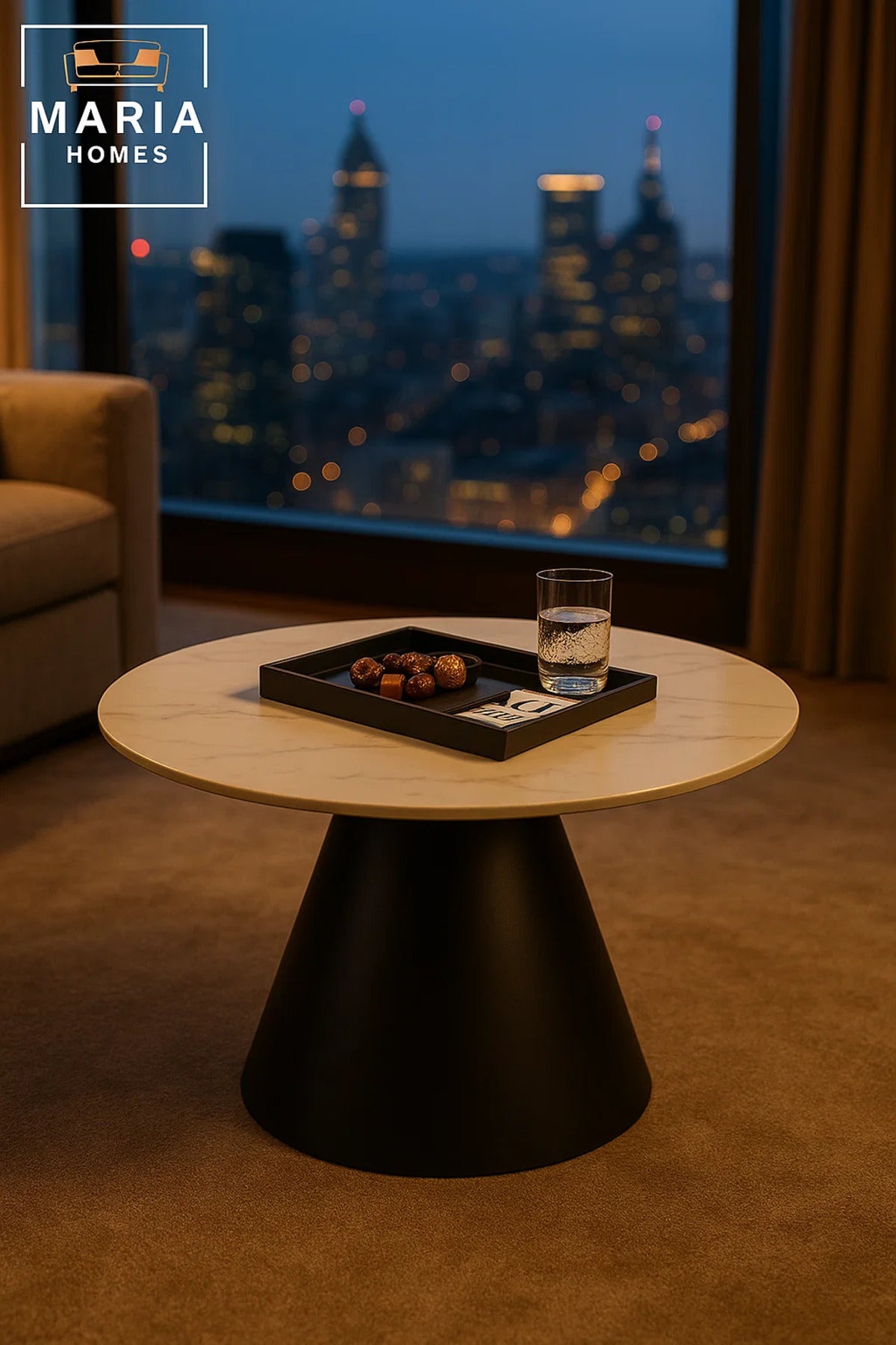Round white marble table with black cone base