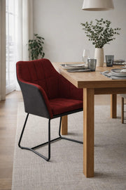 Contemporary Red Upholstered Dining Armchair with Black Leather Shell and Durable Metal Sled Base
