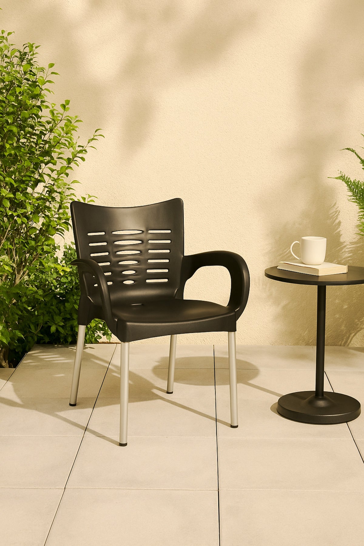 Modern Black Plastic Outdoor Armchair for Garden, Patio & Balcony Stylish and Comfortable Design