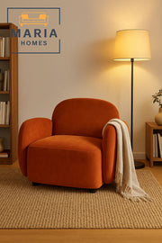 Plush Burnt Orange Lounge Chair with Curved Back and Padded Arms