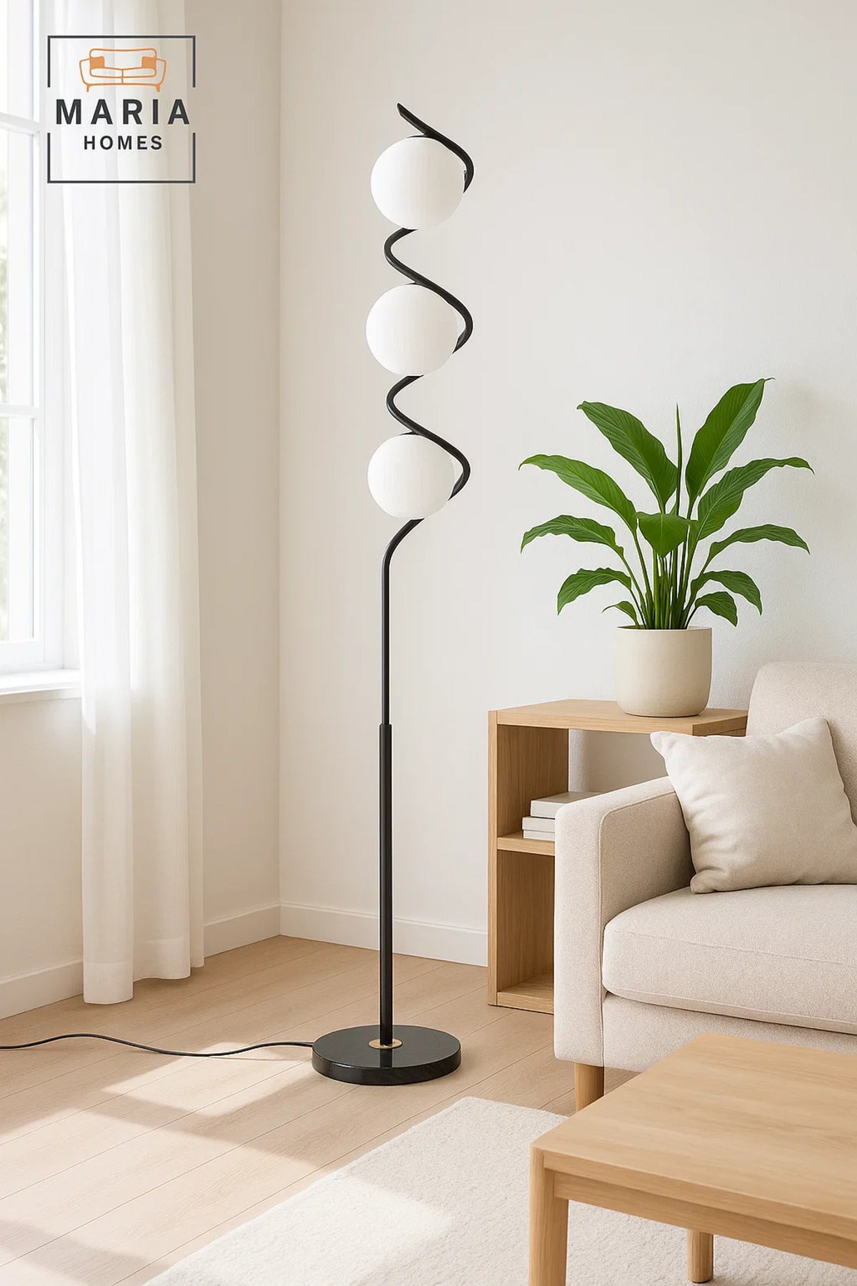 Stylish floor lamp with a spiral black frame and three frosted globes Great for modern interiors